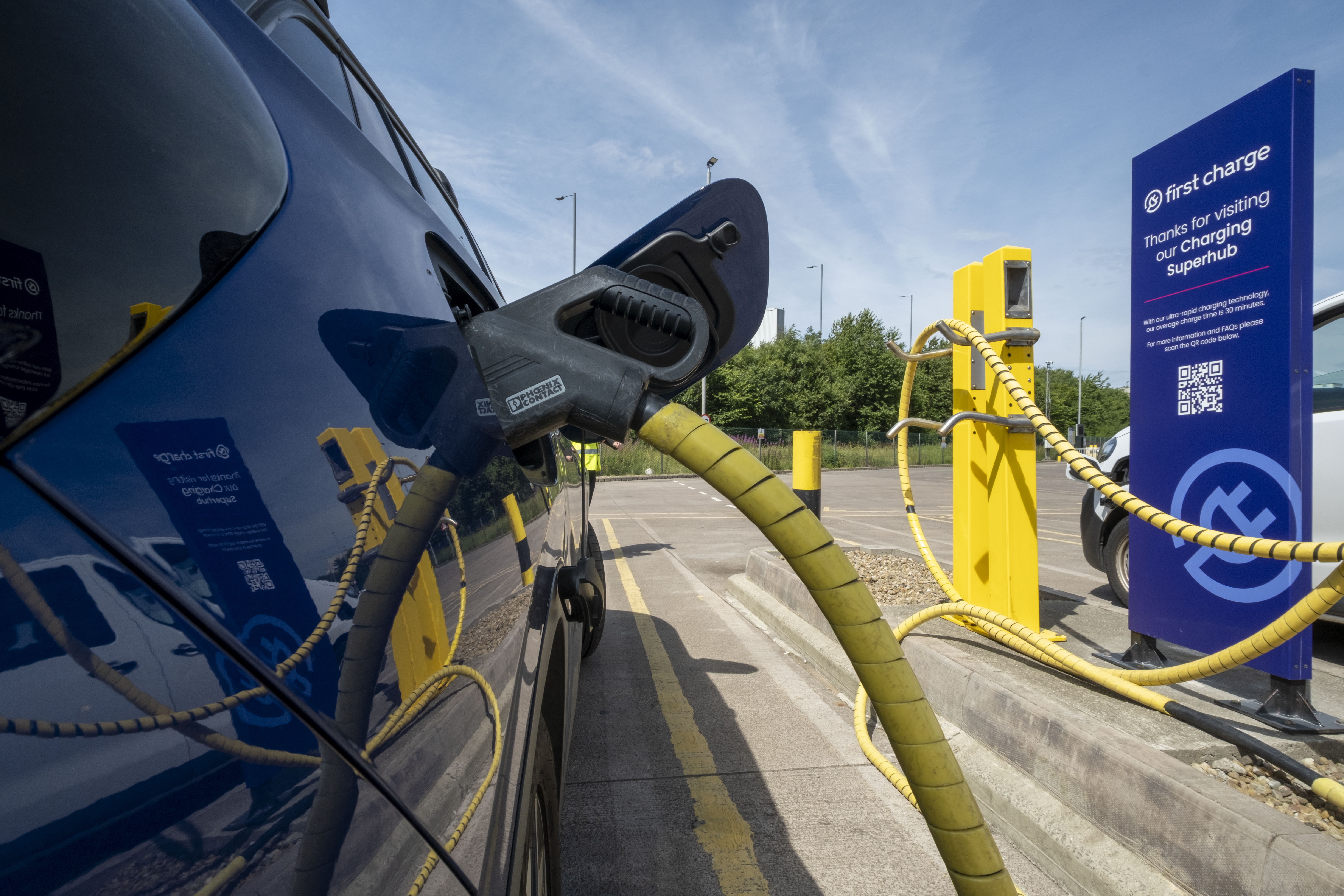 a close up of a car getting charged 