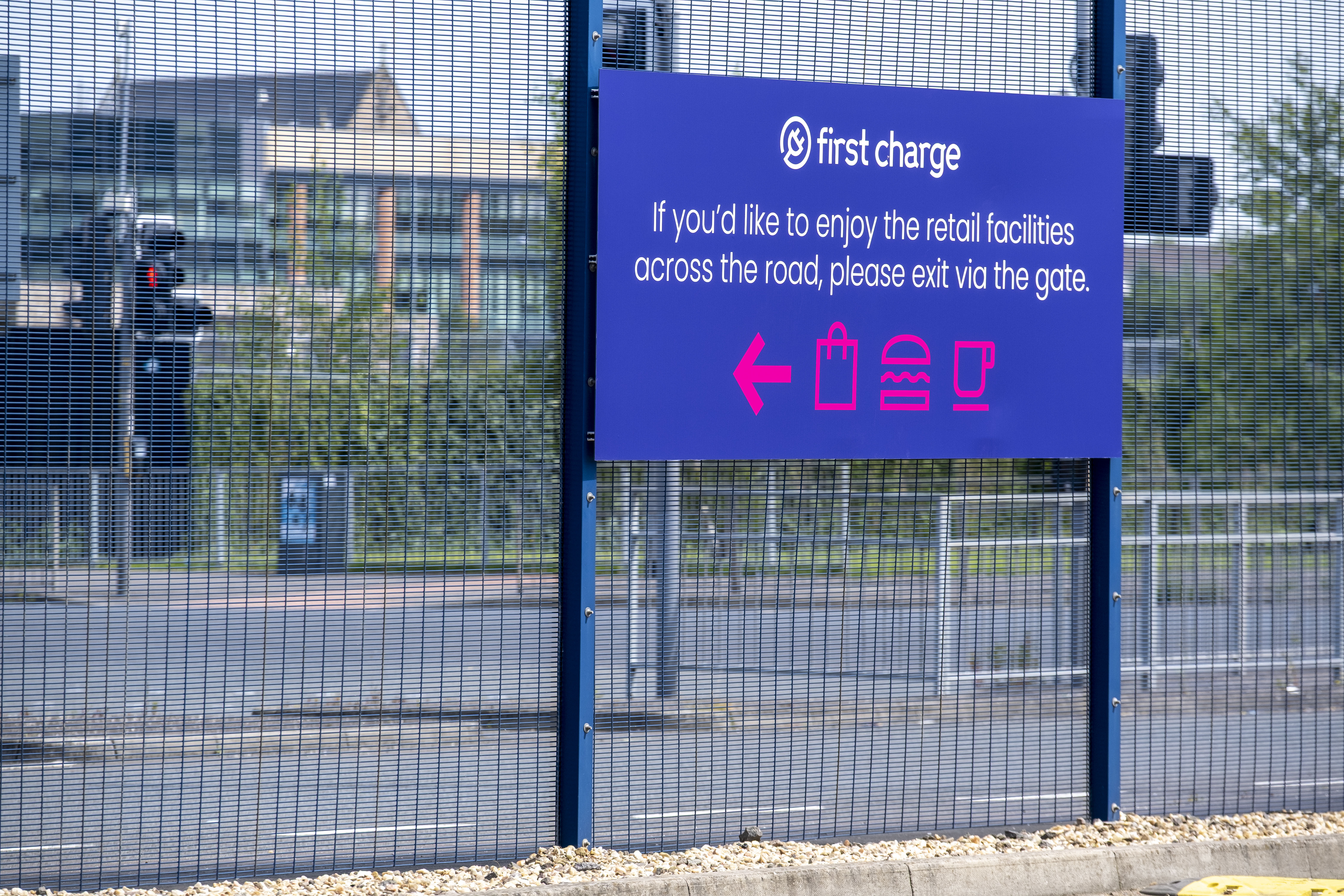 first charge signage pointing to retail facilities