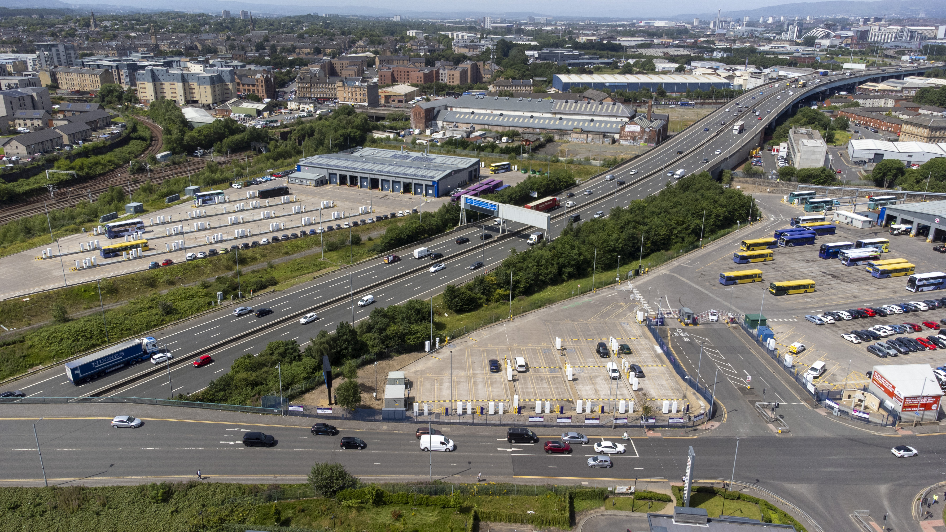 birds eye view of city skyline and charging site