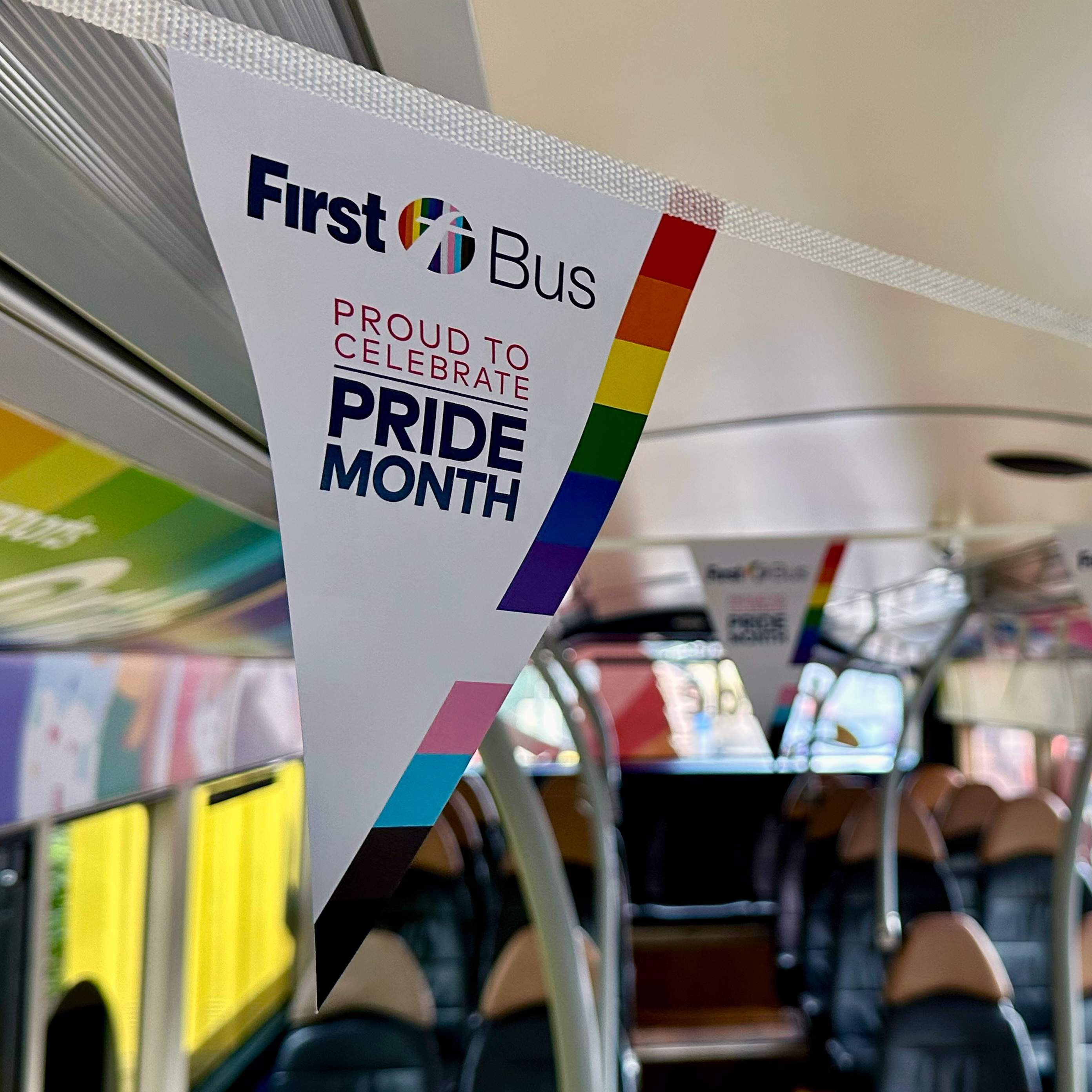 Pride month bunting inside the bus.
