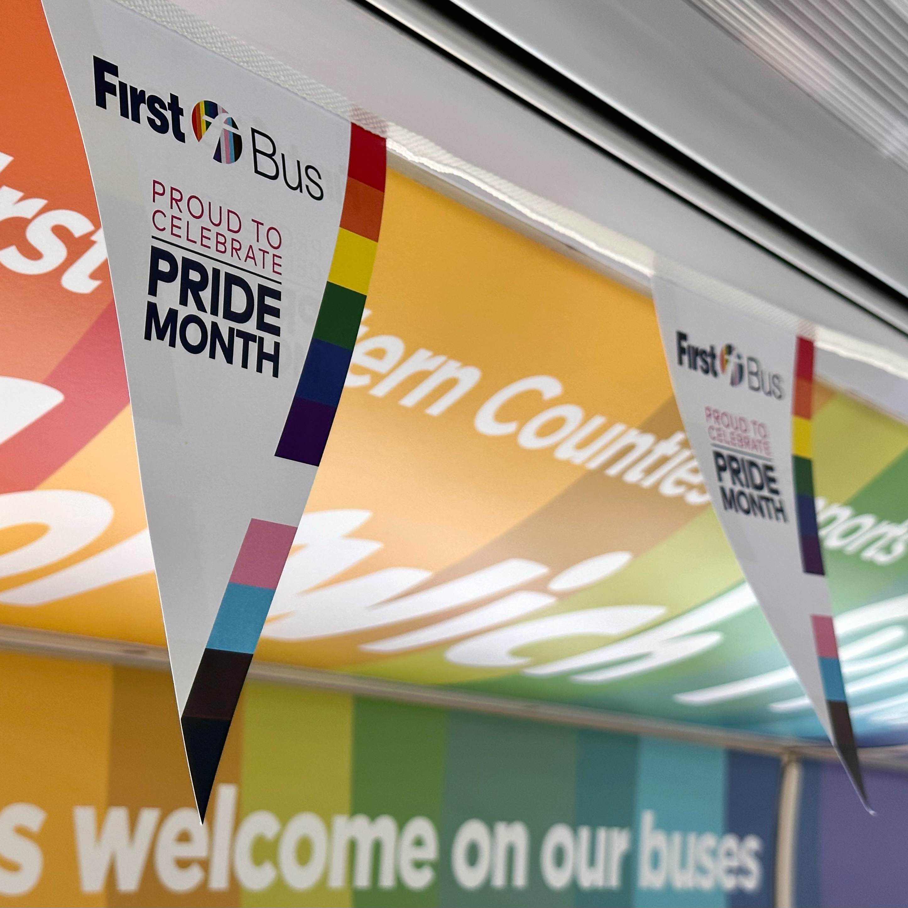 Pride month bunting inside the bus.